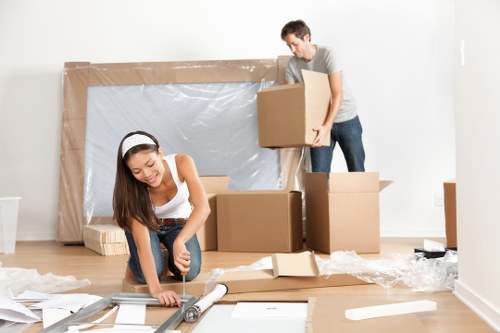 Furniture removals team preparing items in Poplar