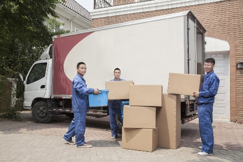 Removal van and moving boxes prepared for a property move