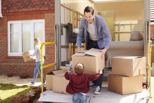 Removal team handling boxes safely during a planned move