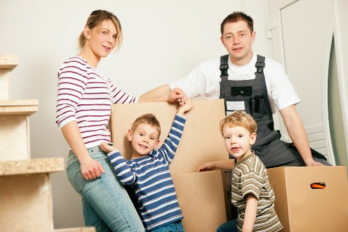 Professional piano removals in Poplar with careful wrapping and lifting