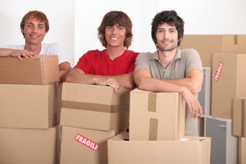 Removal van loading household items during a Poplar move