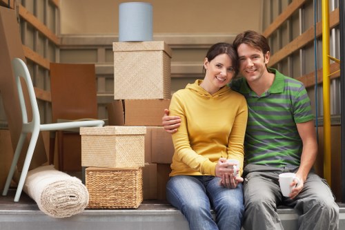 Carefully labeled boxes prepared for a house move in Poplar