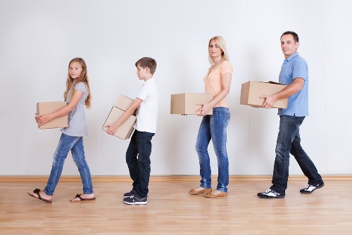 Secured moving equipment and strapped items in a removals vehicle