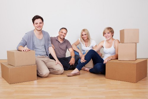 Piano movers in Poplar navigating stairs and tight access