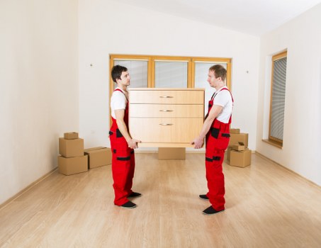 Packing and preparing items for a moving truck in Poplar