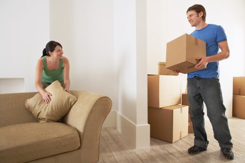 Moving day in Poplar with labeled boxes and careful loading
